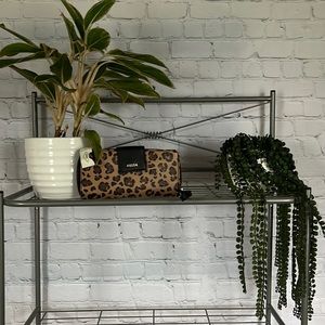 Never used FOSSIL cheetah print clutch